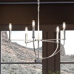 An UHP3971 Modern Farmhouse Chandelier 20''H x 22.375''W, Brushed Nickel Finish, Armidale Collection by Urban Ambiance in a living room.