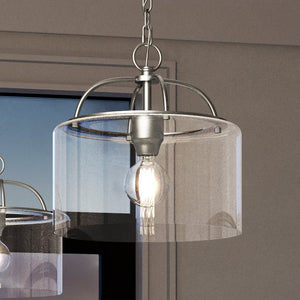 An Urban Ambiance UHP3972 Modern Farmhouse Pendant 13''H x 13''W, Brushed Nickel Finish, Armidale Collection lighting fixture hanging over a window.