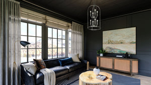 A living room with unique Armidale Collection furniture and a beautiful UHP3974 Modern Farmhouse Chandelier.