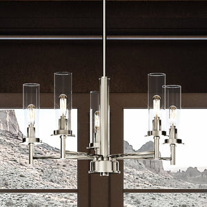 An Urban Ambiance UHP3981 New Traditional Chandelier hanging in a beautiful room with mountains in the background.