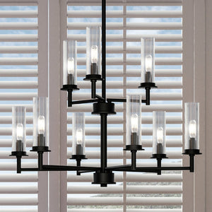An Urban Ambiance UHP3985 New Traditional Chandelier 34.25''H x 28''W, Midnight Black Finish, Griffith Collection with a glass shade in front of a window that