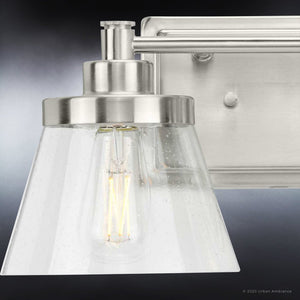 A beautiful Urban Ambiance bathroom light fixture with a clear glass shade.