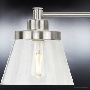 An Urban Ambiance UHP3991 Traditional Bath Light 7.75''H x 24.5''W, Brushed Nickel Finish, Pawtucket Collection light fixture with a beautiful glass