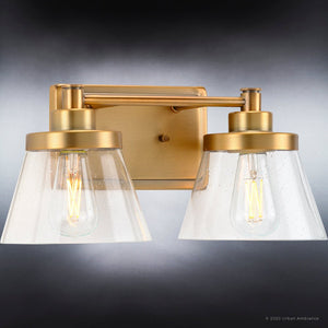 An Urban Ambiance bathroom light fixture with two clear glass shades: UHP3993 Traditional Bath Light 7.75''H x 15.5''W, Olde Brass Finish, Paw