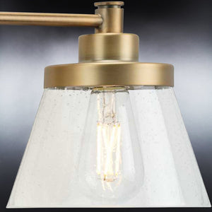 A beautiful lighting fixture from the Pawtucket Collection, the Urban Ambiance UHP3994 Traditional Bath Light features a glass shade and an Olde Brass finish.