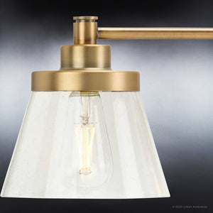 A luxury Urban Ambiance UHP3995 Traditional Bath Light 7.75''H x 33.5''W, Olde Brass Finish, Pawtucket Collection with a clear