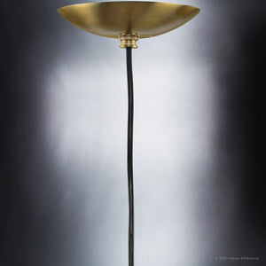 An Urban Ambiance lighting fixture with a unique brass floor lamp and a gorgeous black shade.