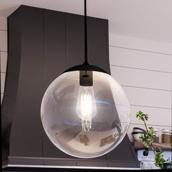 A unique pendant lamp with a luxurious Midnight Black Finish from the Canton Collection by Urban Ambiance, hanging in the kitchen.