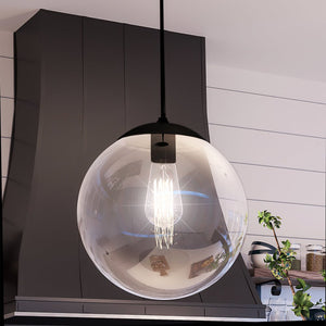 A unique pendant lamp with a luxurious Midnight Black Finish from the Canton Collection by Urban Ambiance, hanging in the kitchen.