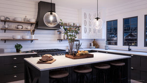 A beautiful kitchen with white cabinets and the UHP4018 Minimalist Pendant lamp 12.5''H x 12''W, Midnight Black Finish, Canton Collection counter tops by Urban Ambiance