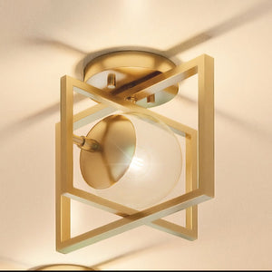 A beautiful UHP4020 Minimalist Ceiling Light 9.75''H x 12''W, Brushed Bronze Finish, Canton Collection from Urban Ambiance with a glass shade,