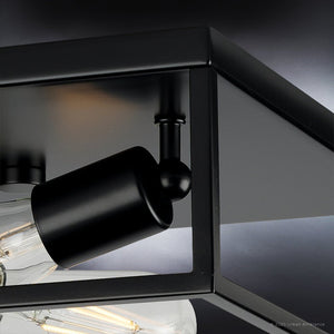 A beautiful modern ceiling light from the Singleton Collection, featuring a midnight black finish and including a light bulb.