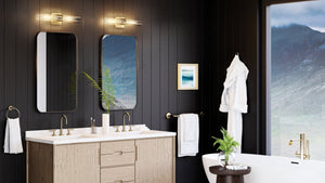 A luxury bathroom with gorgeous black walls and wooden floors, featuring a statement lighting fixture.
