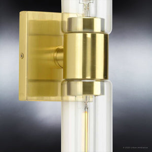 A gorgeous Urban Ambiance UHP4051 Cosmopolitan Bath Light with a satin gold finish and a clear glass cylinder.