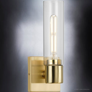 A beautiful Cosmopolitan Wall Sconce with a clear glass cylinder, part of the Tustin Collection by Urban Ambiance.