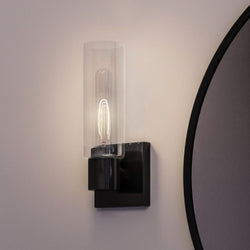A unique UHP4057 Cosmopolitan Wall Sconce with a gorgeous round mirror.