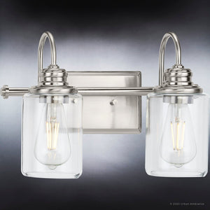 A unique Urban Ambiance bathroom light fixture with two UHP4061 Vintage Bath Light 9.875''H x 14.625''W, Brushed Nickel Finish, Hedland Collection clear