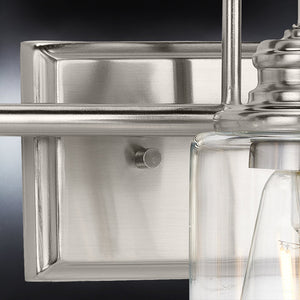 A gorgeous bathroom light fixture, the UHP4062 Vintage Bath Light features a brushed nickel finish and clear glass bulb from the Hedland Collection.