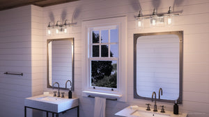 A beautiful bathroom with two UHP4062 Vintage Bath Light 9.875''H x 23.375''W, Brushed Nickel Finish, Hedland Collection sinks and a window