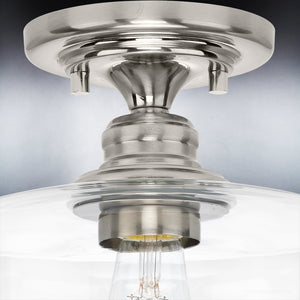 An Urban Ambiance UHP4064 Vintage Ceiling Light 9''H x 9''W, Brushed Nickel Finish, Hedland Collection with a clear glass shade that adds gorgeous lighting to any