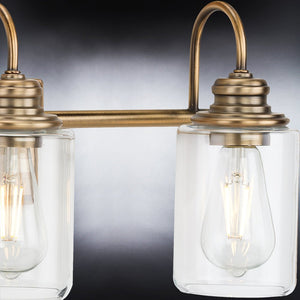 A luxury bathroom light fixture with two unique UHP4067 Vintage Bath Light 9.875''H x 23.375''W, Olde Brass Finish, Hedland Collection clear