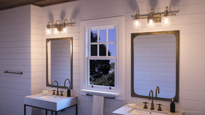 A beautiful bathroom with two UHP4067 Vintage Bath Light 9.875''H x 23.375''W, Olde Brass Finish, Hedland Collection sinks and a mirror by Urban
