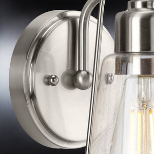A beautiful Coastal Wall Sconce from the Kempsey Collection by Urban Ambiance with a clear glass shade.