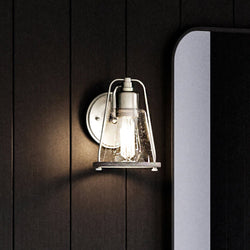 A beautiful Urban Ambiance UHP4070 Coastal Wall Sconce 8.25''H x 6''W, Brushed Nickel Finish, Kempsey Collection with a mirror on