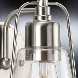 A unique Urban Ambiance UHP4070 Coastal Wall Sconce lighting fixture with a brushed nickel finish.