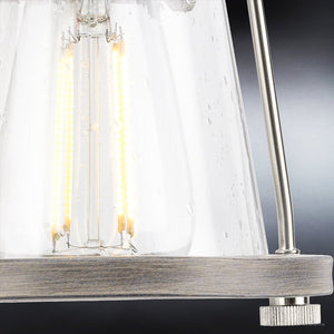 A beautiful and unique Urban Ambiance UHP4070 Coastal Wall Sconce 8.25''H x 6''W, Brushed Nickel Finish, Kempsey Collection light fixture with a