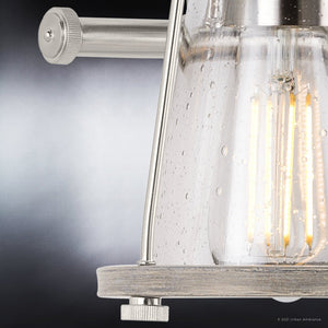 A beautiful UHP4072 Coastal Bath Light with a clear glass shade, featuring a brushed nickel finish, from the luxury Kempsey Collection by Urban Ambiance.
