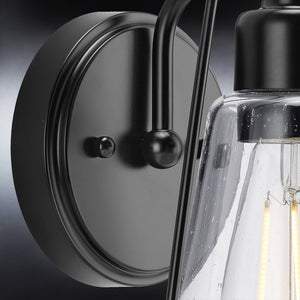 A unique Urban Ambiance UHP4074 Coastal Wall Sconce 8.25''H x 6''W lighting fixture, Midnight Black Finish, Kempsey Collection with a clear