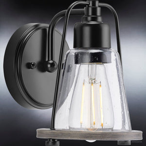 A luxury Coastal Wall Sconce 8.25''H x 6''W, Midnight Black Finish, Kempsey Collection from the brand Urban Ambiance with a clear glass bulb.