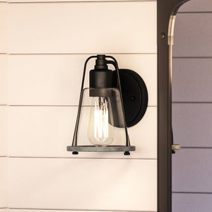 An Urban Ambiance UHP4074 Coastal Wall Sconce 8.25''H x 6''W, Midnight Black Finish from the Kempsey Collection, a beautiful addition to a bathroom