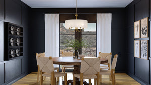 A luxury dining room with a beautiful lighting fixture, the UHP4090 New Traditional Chandelier from Urban Ambiance's Aurora Collection, featuring a brushed bronze finish.
