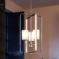 A beautiful UHP4102 Modern Chandelier 25.625''H x 16''W, Brushed Nickel Finish, Broome Collection by Urban Ambiance in a living room.