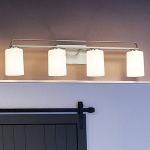 A unique UHP4107 Modern Bath Light 7.625''H x 32.5''W, Brushed Nickel Finish, Broome Collection bathroom light fixture with a glass shade