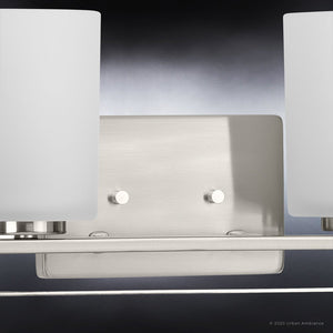 A beautiful Urban Ambiance bathroom light fixture with two white glass shades, the UHP4107 Modern Bath Light 7.625''H x 32.5''W, Brushed