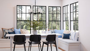 A luxury dining room with a unique Urban Ambiance UHP4108 Modern Chandelier 18.625''H x 24''W, Midnight Black Finish, Broome Collection table and