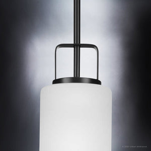 A gorgeous modern pendant lamp with a white glass shade from the Broome Collection by Urban Ambiance.