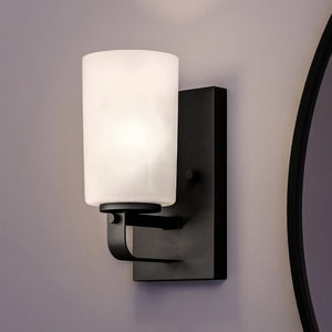 A luxury UHP4112 Modern Wall Sconce with a glass shade, from the Broome Collection by Urban Ambiance.
