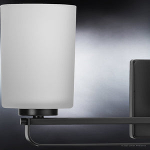 A beautiful UHP4114 Modern Bath Light with a white shade, Midnight Black Finish, Broome Collection by Urban Ambiance.