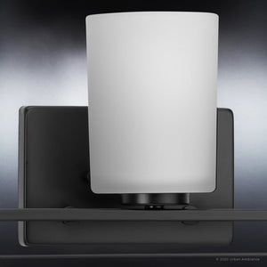An Urban Ambiance UHP4114 Unique Bath Light, featuring a Midnight Black Finish and a white cup, adds luxury to any space.