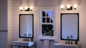 A unique bathroom with two sinks and a window, featuring the UHP4114 Modern Bath Light 7.625''H x 23''W, Midnight Black Finish, Broome Collection from Urban