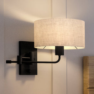 Gorgeous Transitional Wall Sconce with a beautiful white shade.