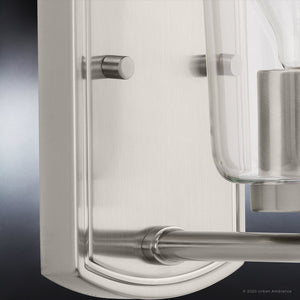 An Urban Ambiance UHP4140 Traditional Wall Sconce 7.75''H x 4.5''W, Brushed Nickel Finish, unique lighting fixture with a clear glass shade