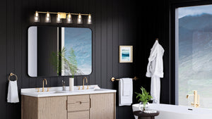 A luxurious bathroom with black walls and unique gold accents, featuring the UHP4149 Traditional Bath Light 7.625''H x 48.5''W from Urban Ambiance's Esperance