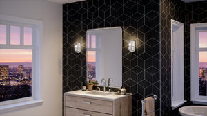 A bathroom featuring a gorgeous UHP4150 Traditional Wall Sconce in Polished Nickel Finish from the Esperance Collection by Urban Ambiance.
