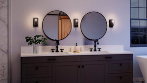 A luxury bathroom with two sinks and two UHP4154 Traditional Wall Sconces 7.75''H x 4.5''W, Midnight Black Finish from the Esperance