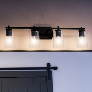A luxurious bathroom with a gorgeous UHP4157 Traditional Bath Light 7.625''H x 32''W, Midnight Black Finish, Esperance Collection from Urban Ambiance.